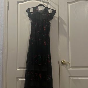 Express maxi dress with sheer and off shoulder detail.